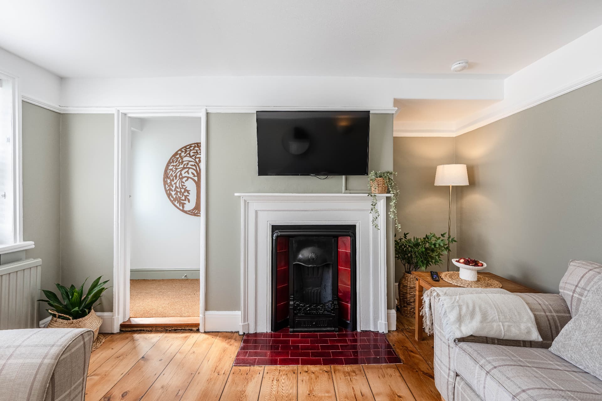 Our cottage, Southwold (living room with fireplace)